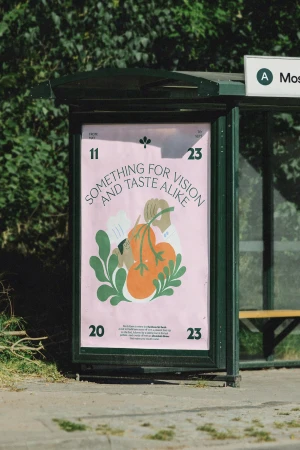 Bus shelter advertising a pink poster with botanical illustration and typography for Flor & Fjære
