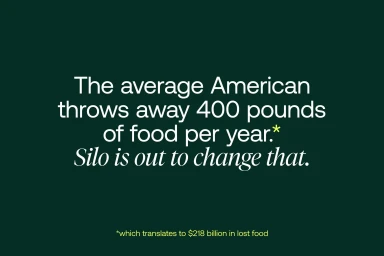 Dark green graphic display with centered white sans-serif and italic serif text about food waste for Silo brand identity.