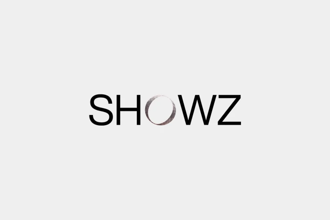 SHOWZ logo against a white background with a silver circle replacing the 'O'. Modern, minimalist brand identity.