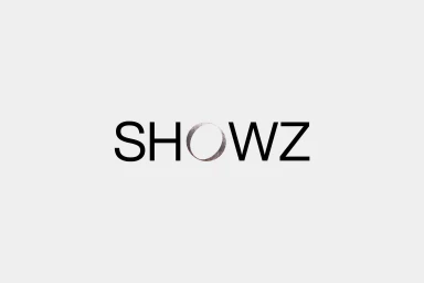 Minimalist typography reading Showz with a circular graphic replacing the letter O against a light grey background