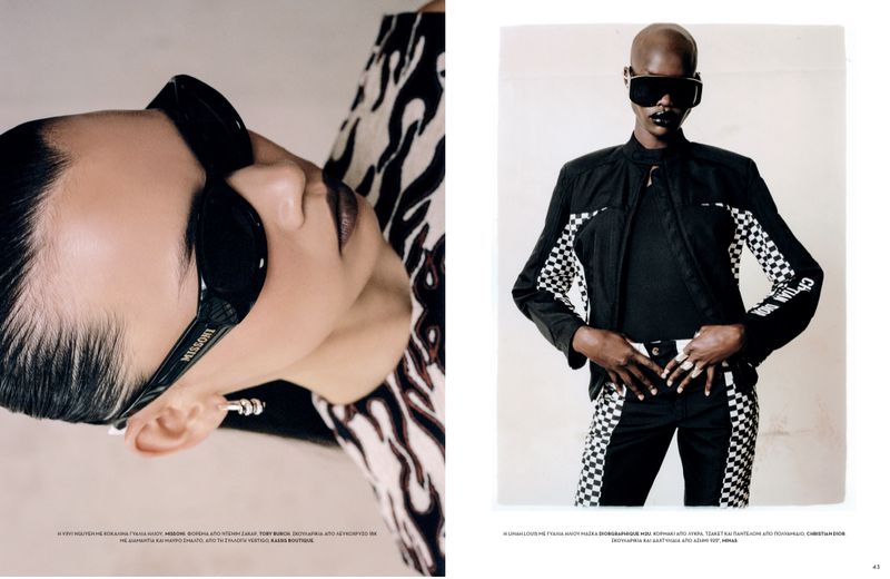 Two fashion models pose in a studio wearing designer outfits and sunglasses, showcasing edgy, modern style and beauty.