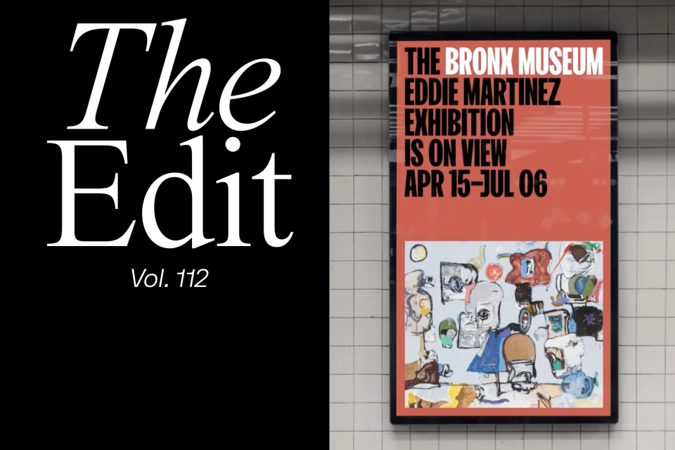 Bronx Museum Eddie Martinez Exhibition poster on tiled wall. The Edit Vol. 112 on black. Bold title, abstract art, public transit setting.