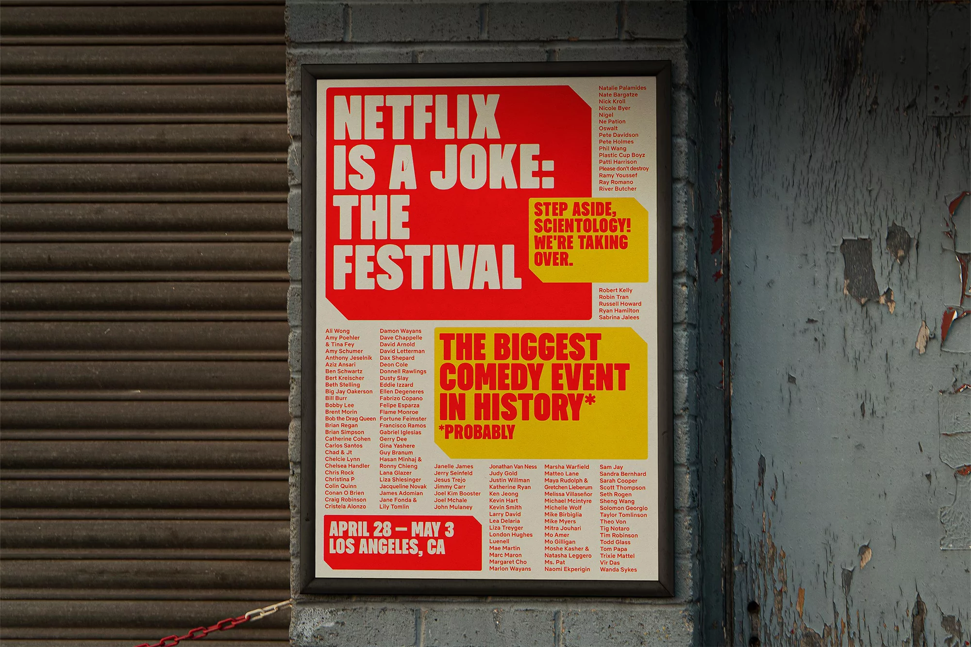 Netflix Is A Joke comedy festival poster in Los Angeles, CA, stapled to a wall with peeling paint, next to corrugated metal.