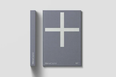 Grey hardcover book with a white cross symbol and spine typography on a plain light background
