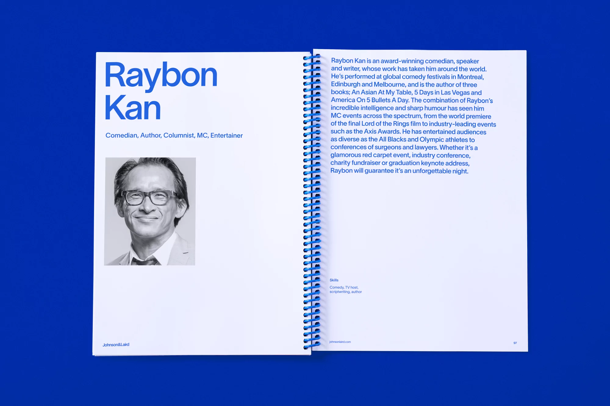 Raybon Kan portrait on an open book, showcasing his titles: Comedian, Author, Columnist, MC, Entertainer, against a solid blue backdrop.