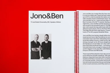 Open ring-bound publication layout featuring typography, a black and white portrait of two men, and columns of descriptive text on a red background.