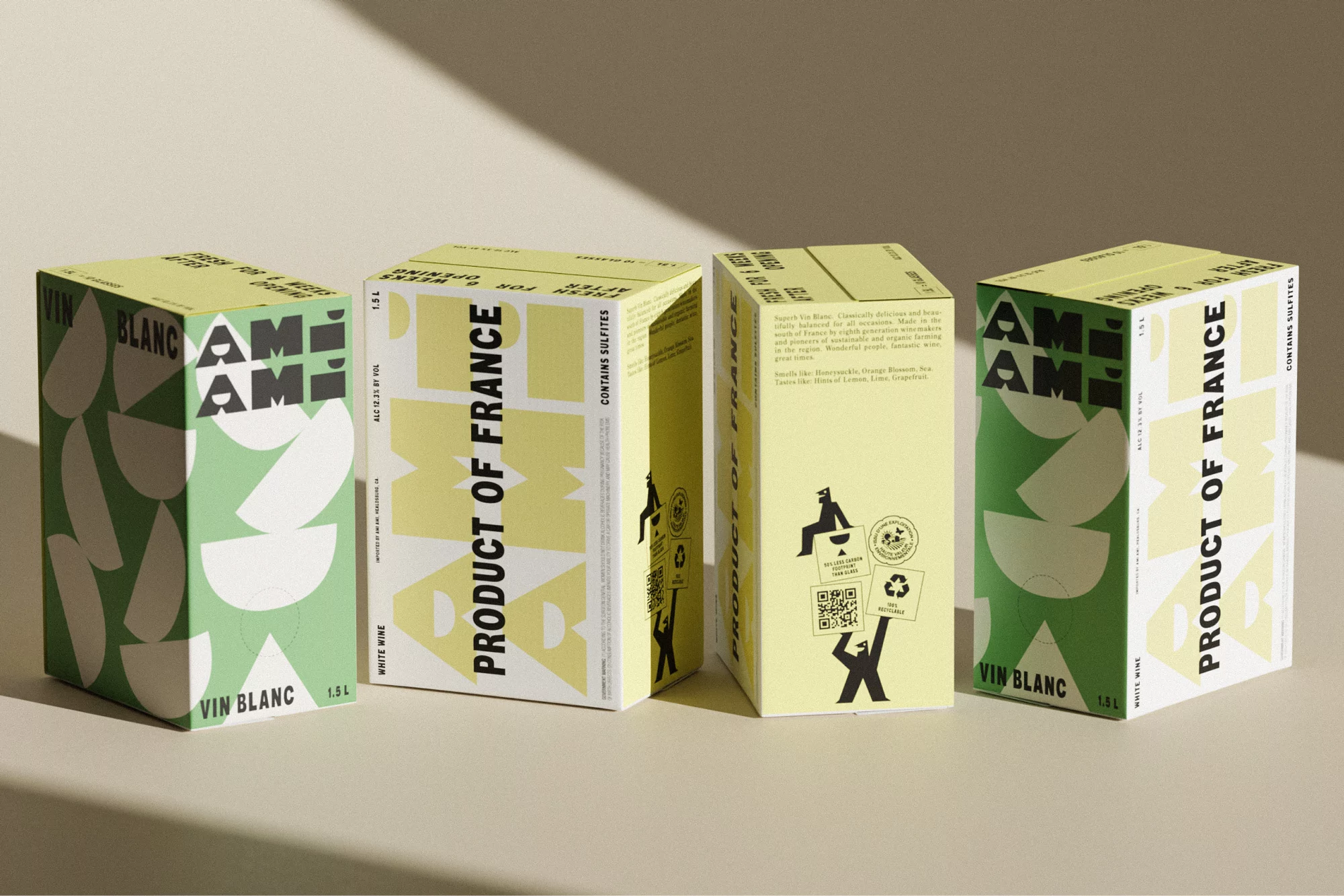 Four rectangular beverage cartons of AMI Vin Blanc wine, two green and two yellow, arranged on a plain light background with soft light.