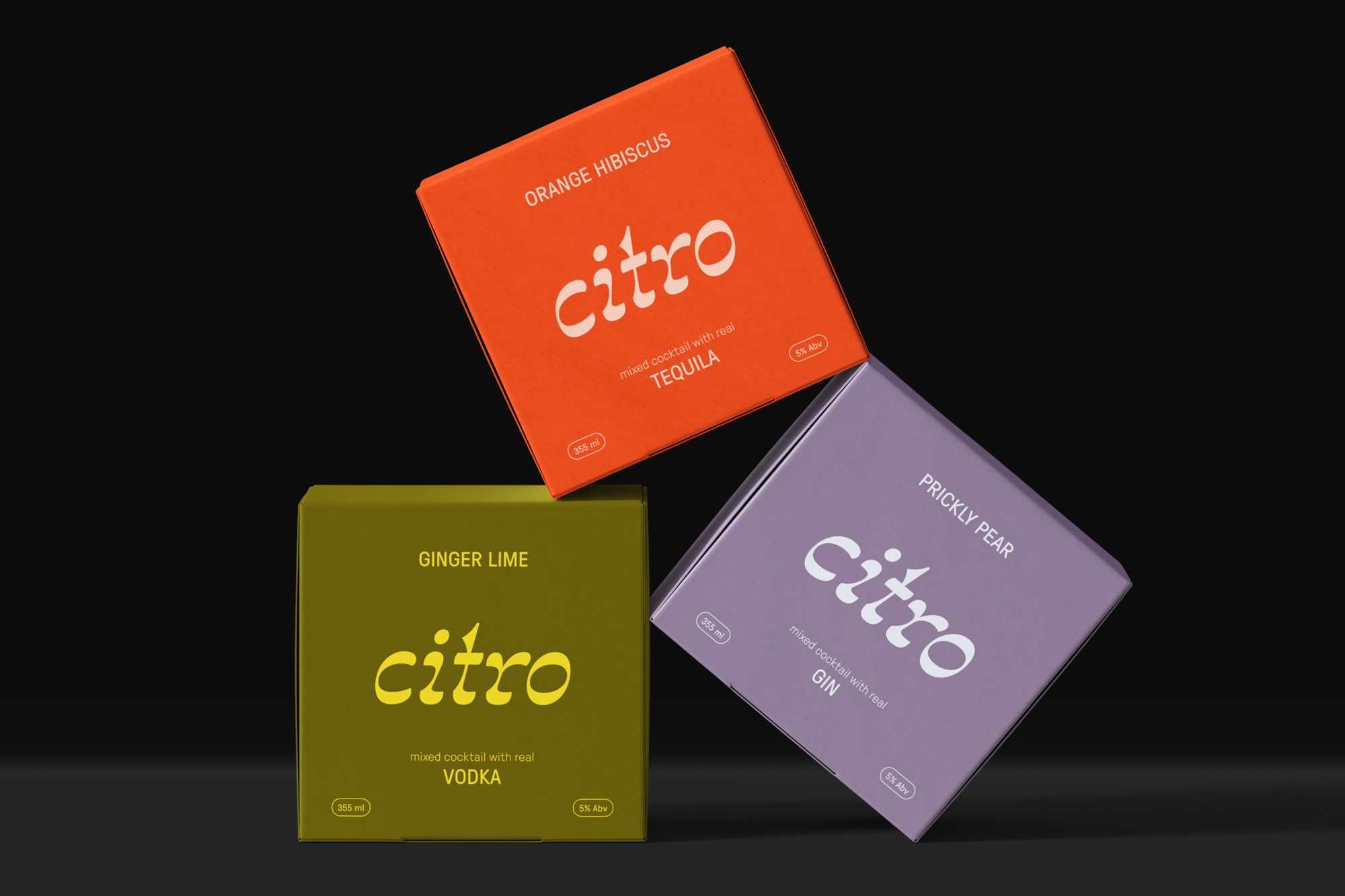 Three colorful Citron mixed cocktail boxes, Orange Hibiscus Tequila, Ginger Lime Vodka, and Prickly Pear Gin, stacked against black.