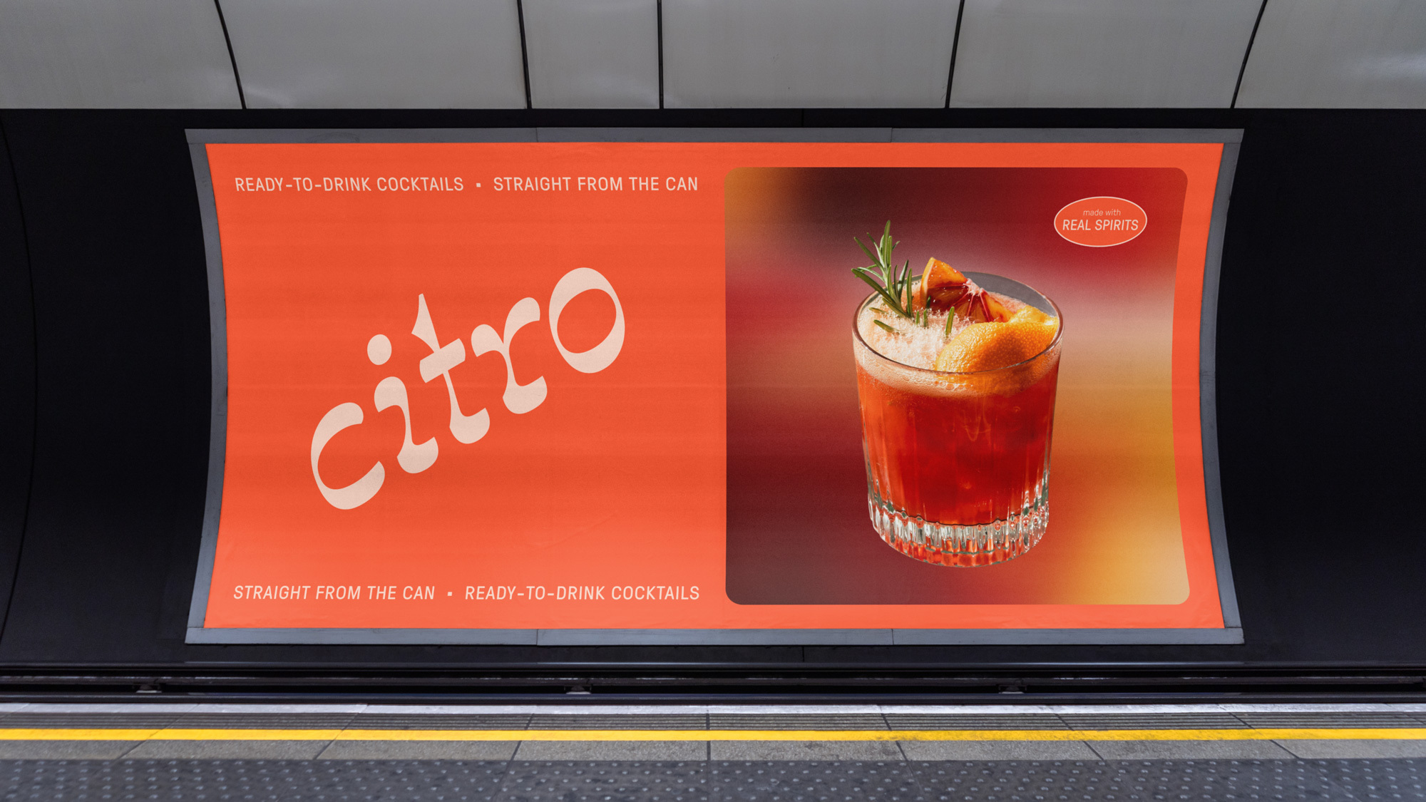 Advertising billboard displaying 'Citro' canned cocktails. An orange cocktail garnished with rosemary appears on the right side.