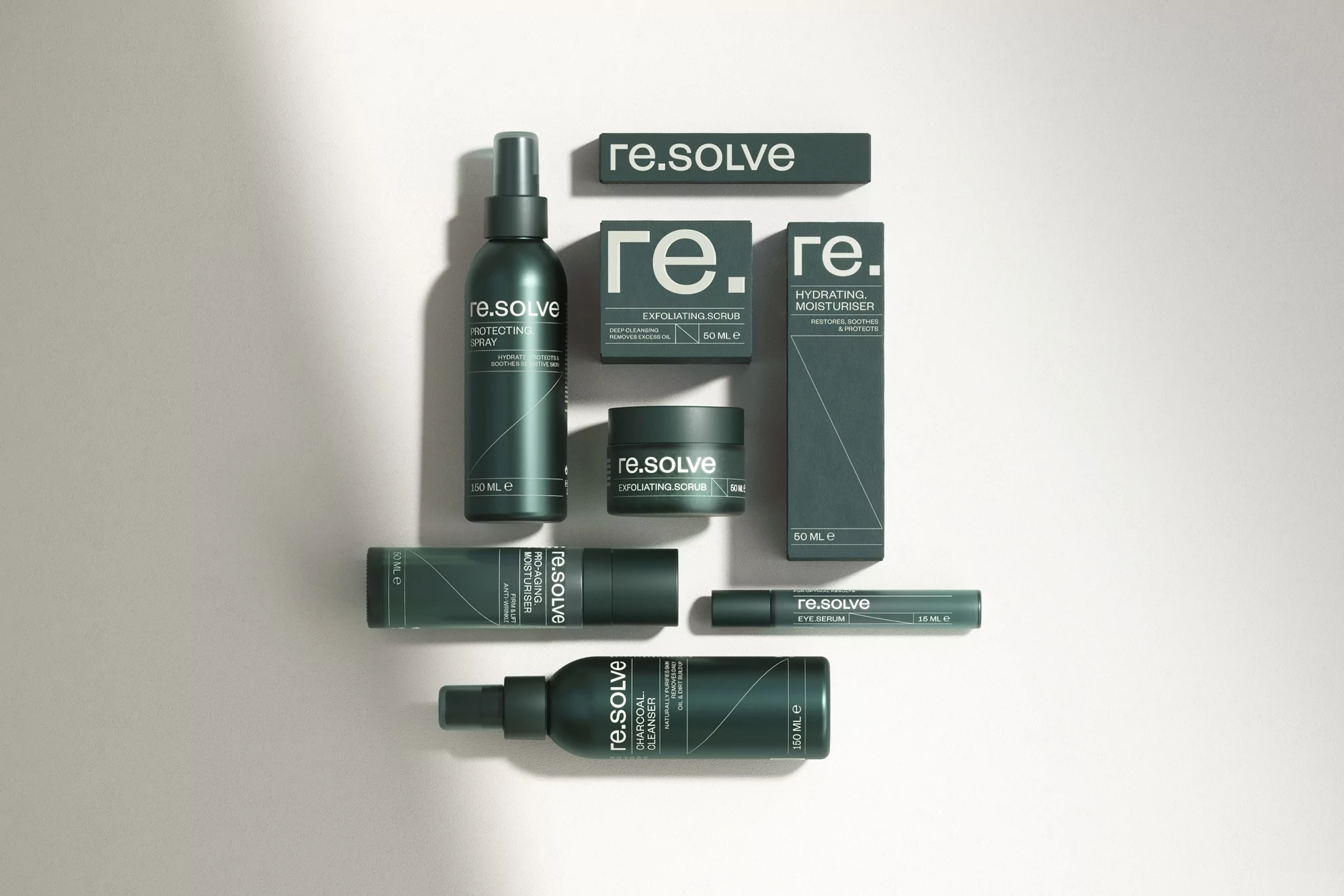 A collection of re.solve brand skincare products are displayed in a minimalist arrangement against a light-colored surface, top-down.