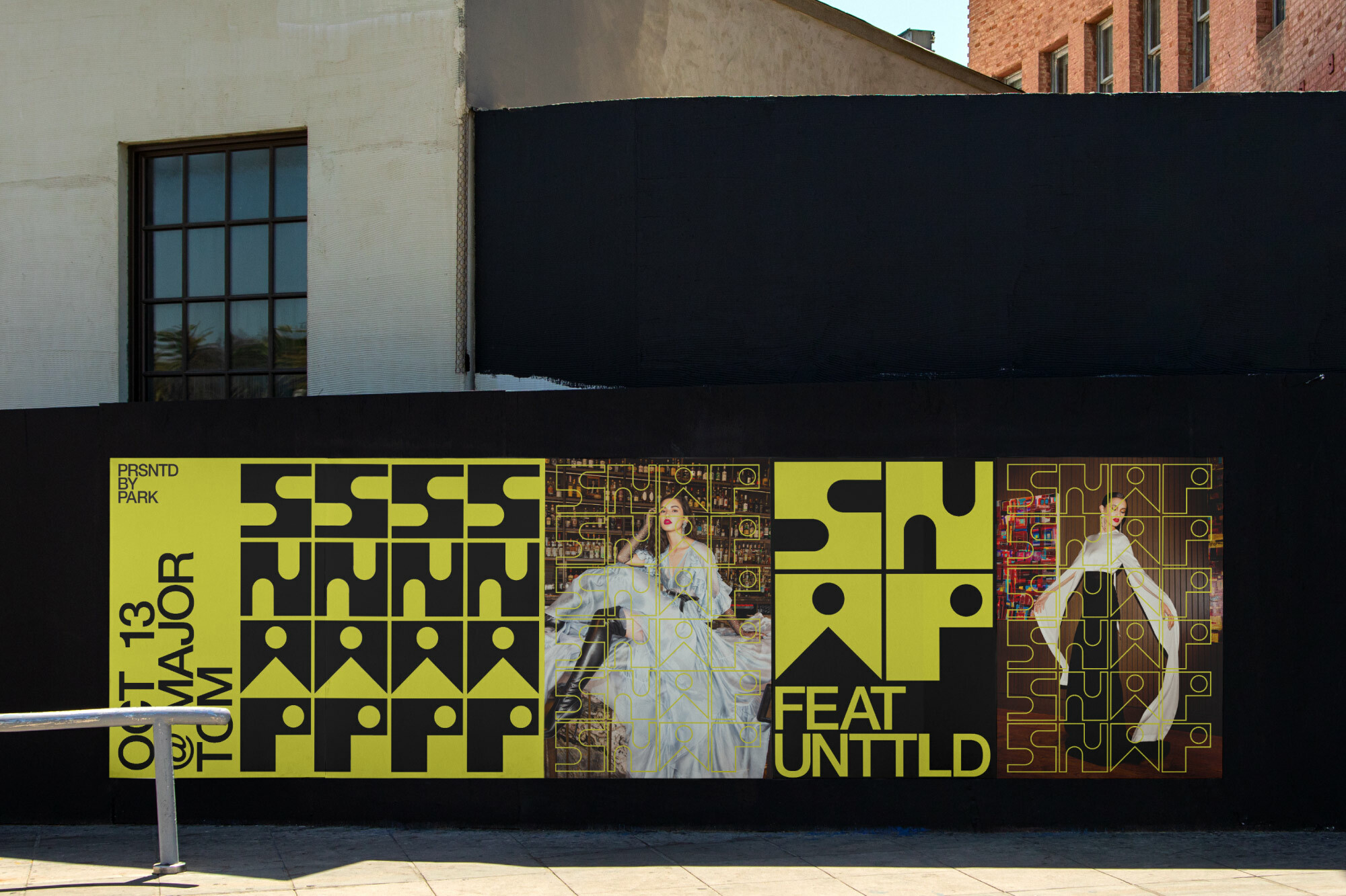Outdoor advertising display features fashion posters with model portraits, geometric patterns, and brand typography in black and yellow hues.