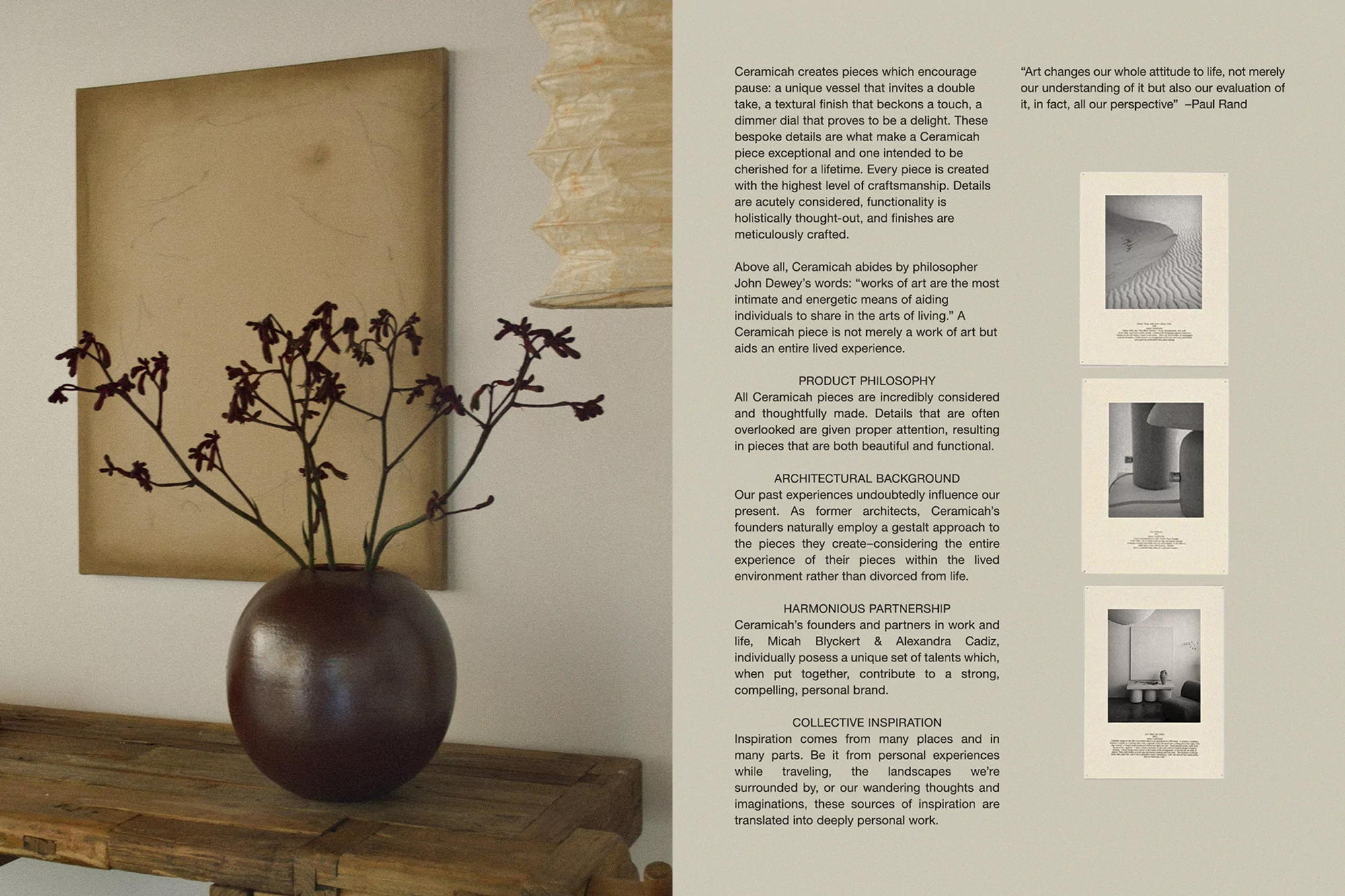 Brown spherical vase with dark brown branch arrangement on a wooden table against an off-white wall with neutral painting.