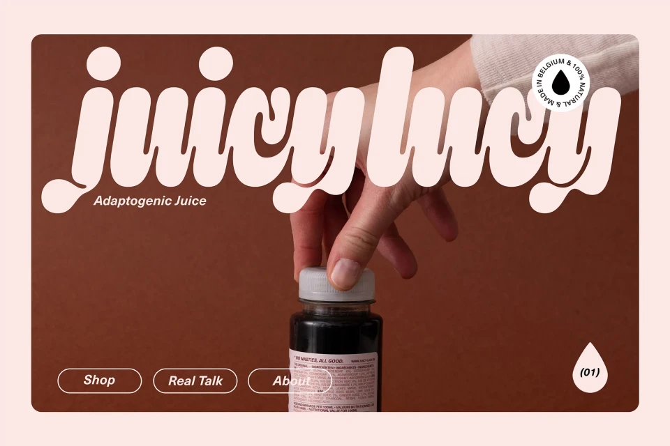 Juice bottle held by a hand against a brown background with the brand name 'Juicy Lucy' in large letters, promoting adaptogenic juice.