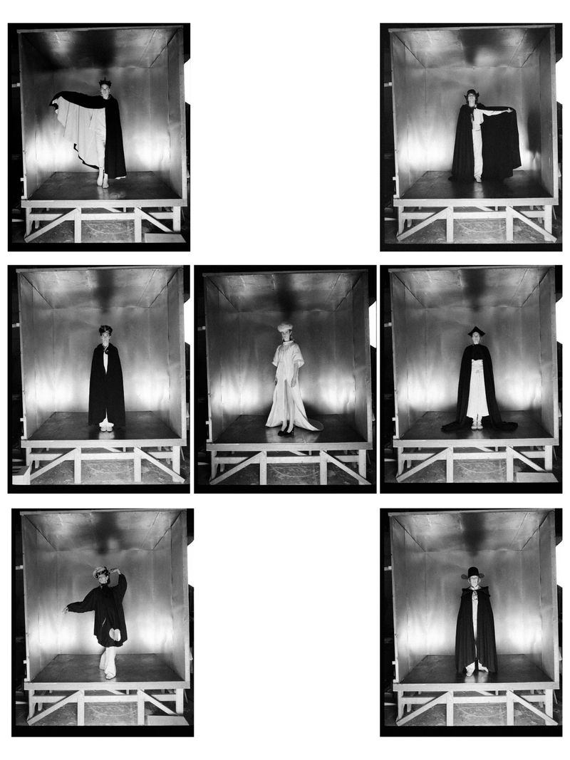 Seven fashion photographs showcase a person in theatrical capes and gowns, standing on platforms inside square boxes in a photo studio.
