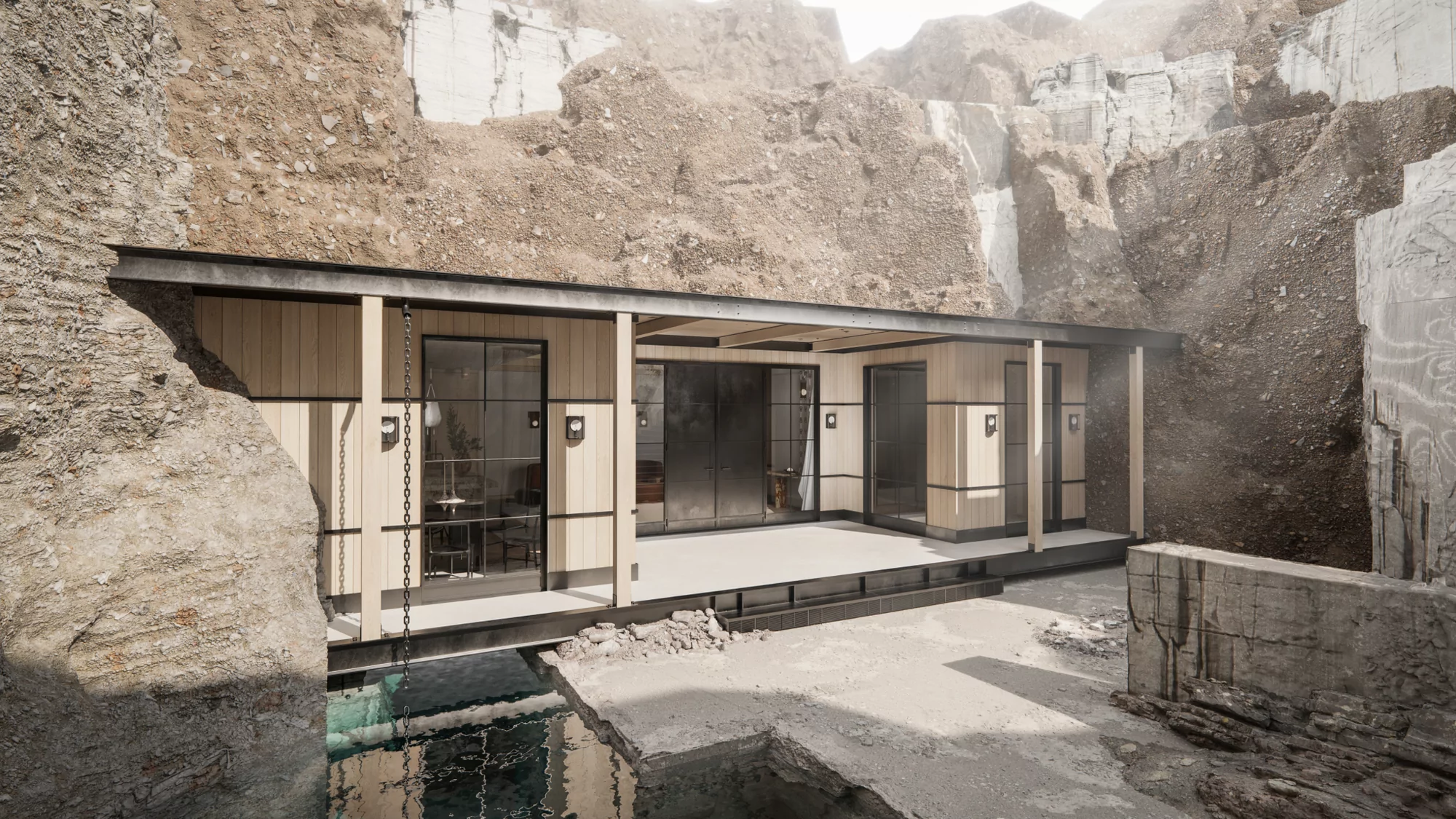 Modern cabin architecture nestled within a rocky quarry, featuring wood paneling, black frames, and reflecting water.