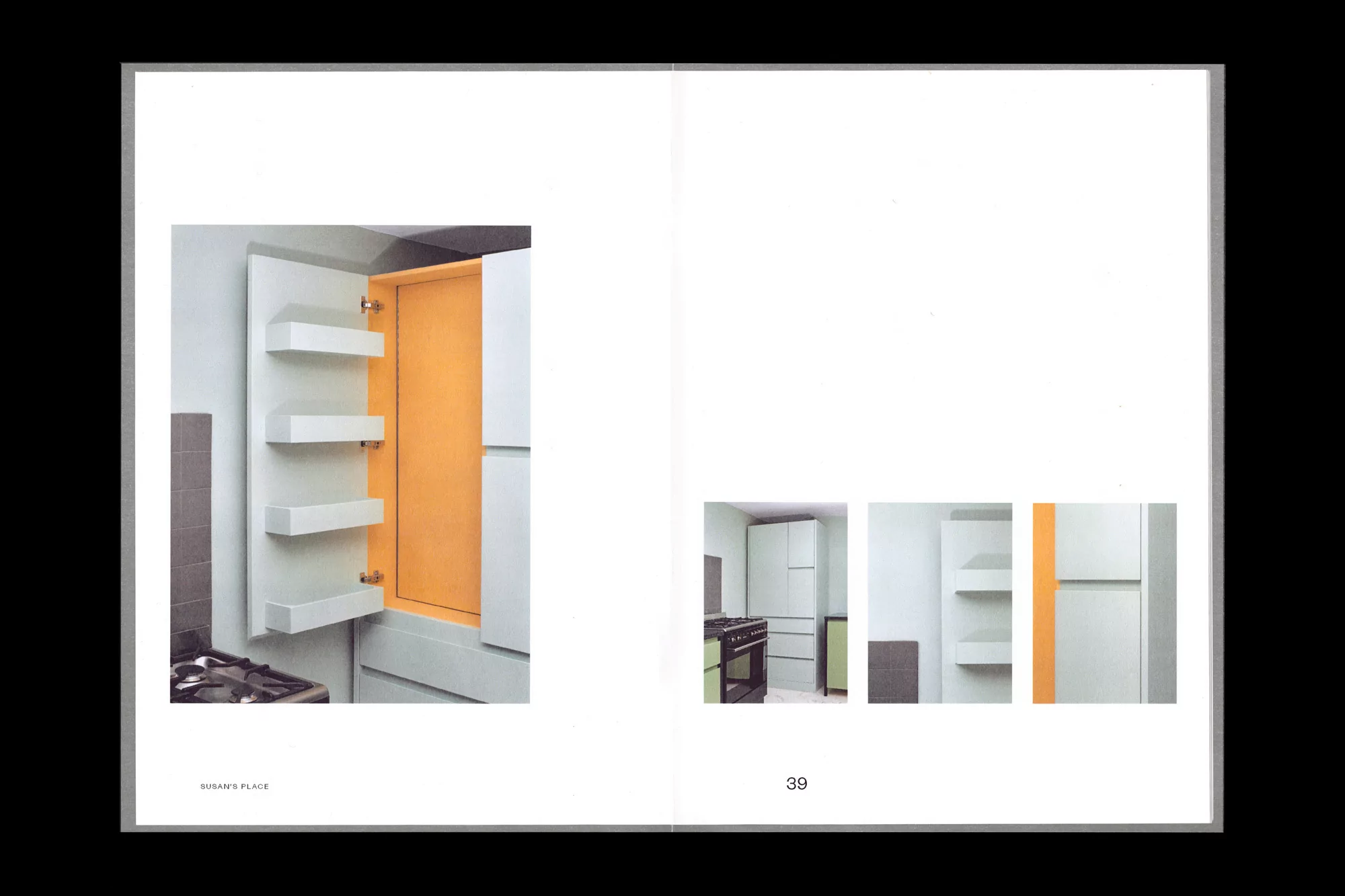 Open kitchen cabinet showcases organized shelving with warm yellow interior and white exterior, alongside a cooking range and kitchen setup.