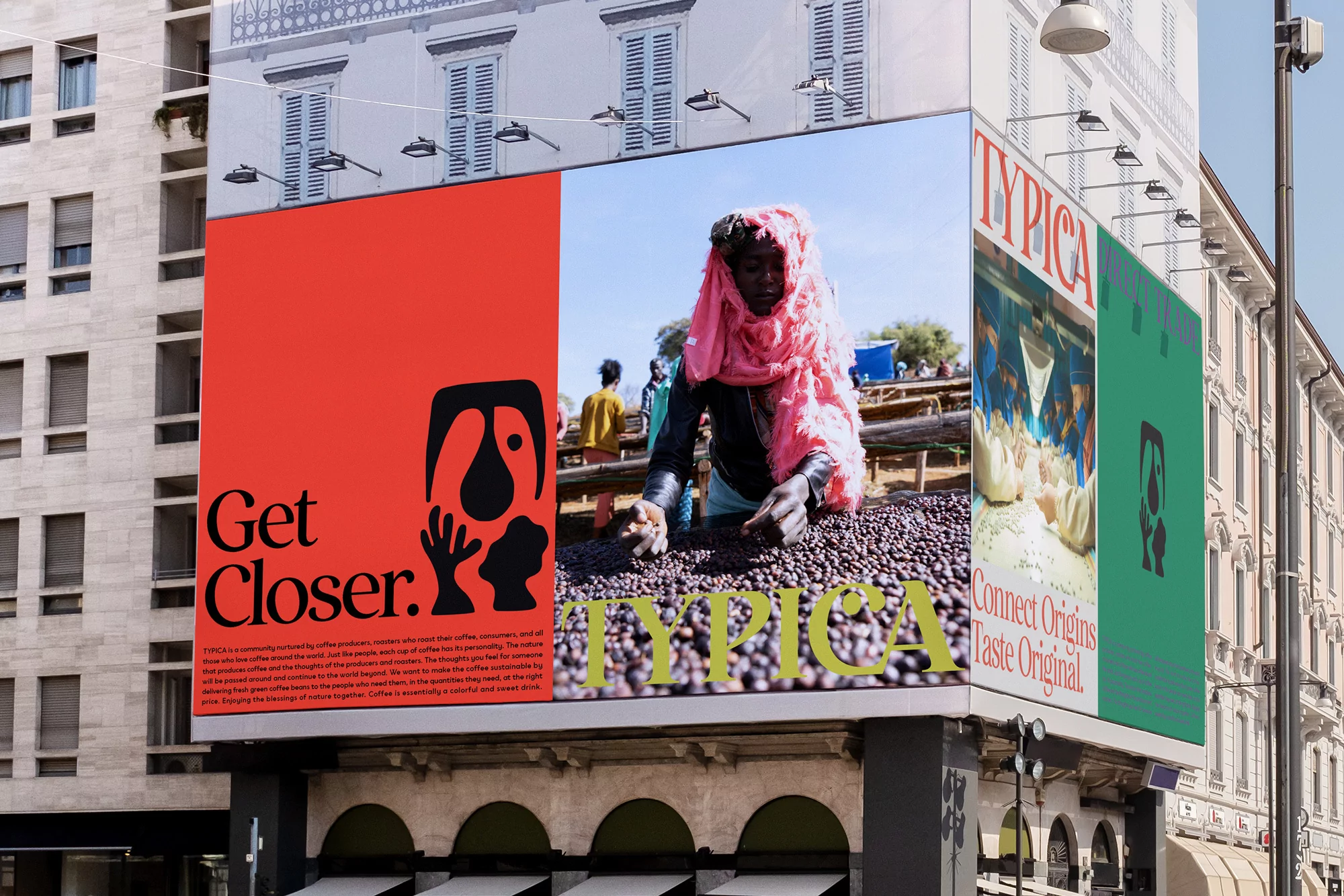 Outdoor billboard featuring a woman picking coffee beans, along with modern typography and design elements in a busy urban environment.