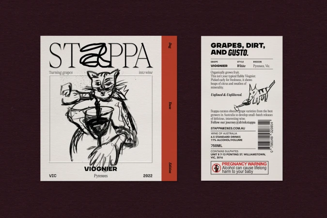 Wine label with an artistic sketch of a cat holding a glass of wine, set against a maroon background with text on the front and back.