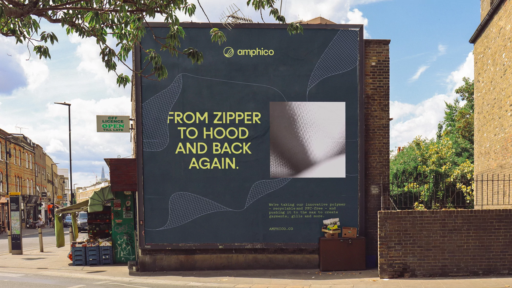 Outdoor billboard advertisement for Amphico features the brand logo, design elements, and product imagery in an urban environment.