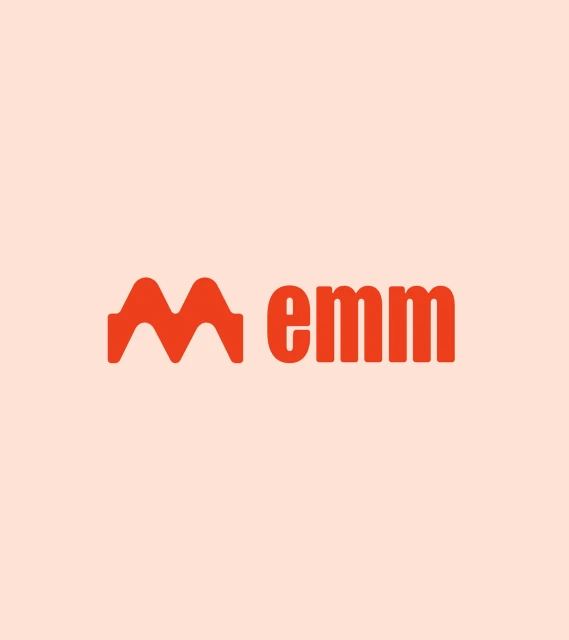 Logo of 'emm' in orange against a peach background, featuring a stylized 'm' symbol alongside the lowercase text 'emm'.