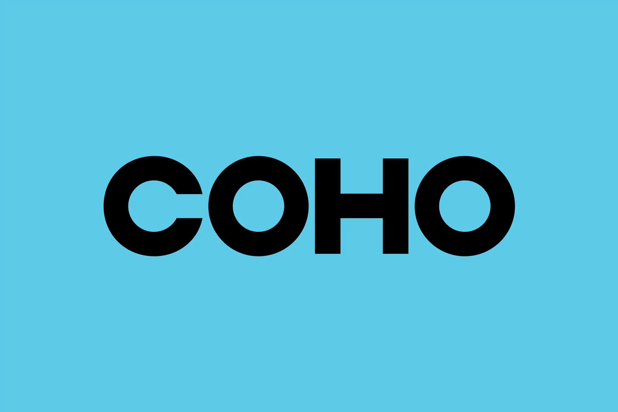 A bold typographic logo displaying the word 'COHO' in a clean sans-serif font, set against a vibrant light blue background.