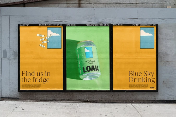 Outdoor advertisement featuring a green and white Loah beverage can in the center with orange panels displaying text and graphics.