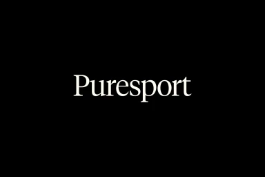 White serif brand typography spelling Puresport centered on a solid black background.
