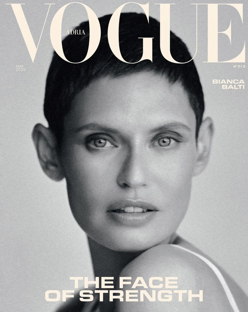 Vogue cover featuring a close-up portrait of Bianca Balti. The image is black and white with the magazine's logo at the top.