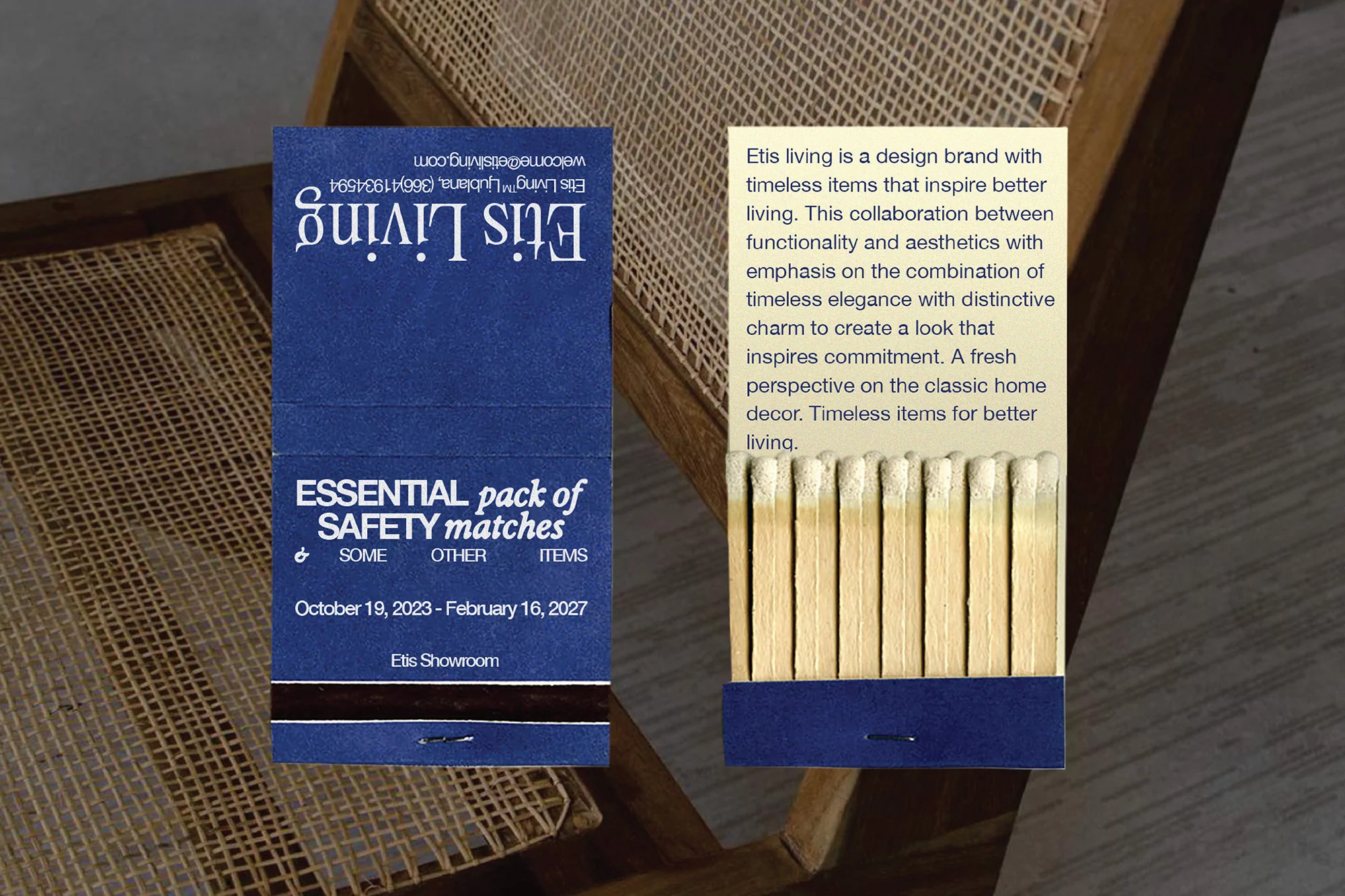 Close-up of an Etis Living matchbox on a wooden chair, showcasing the company's branding and product design in a lifestyle setting.