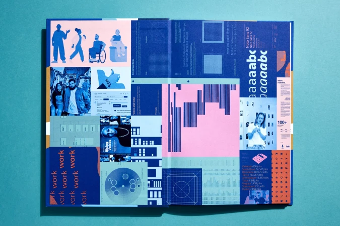 Open magazine spread features graphic design layouts with illustrations, photography, charts, and typography on a blue background.