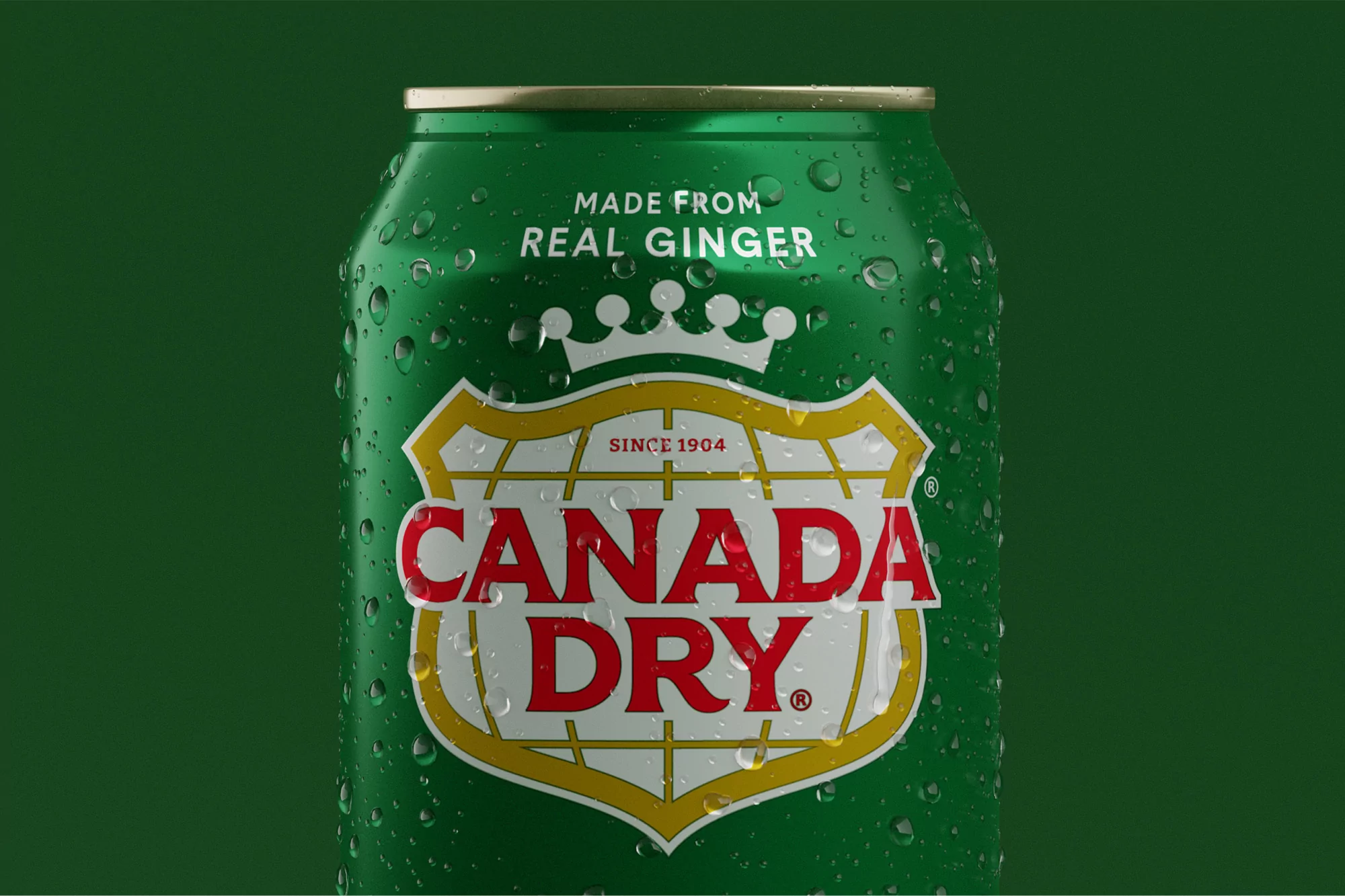 A green Canada Dry ginger ale can features water droplets on its exterior, set against a matching green backdrop.
