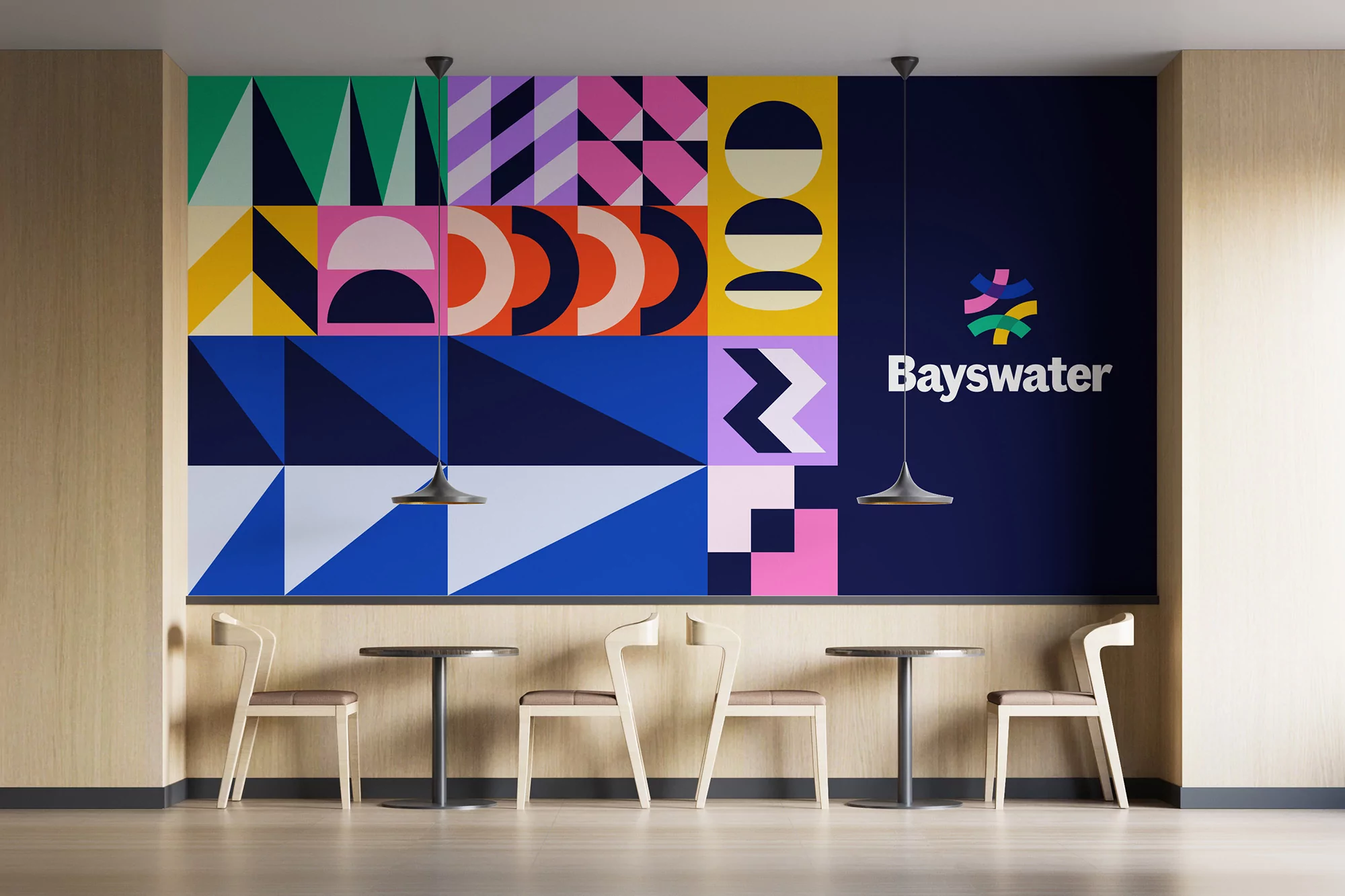 Modern interior design featuring colorful geometric mural, minimalist wood chairs, and pendant lighting in a bright, contemporary space.