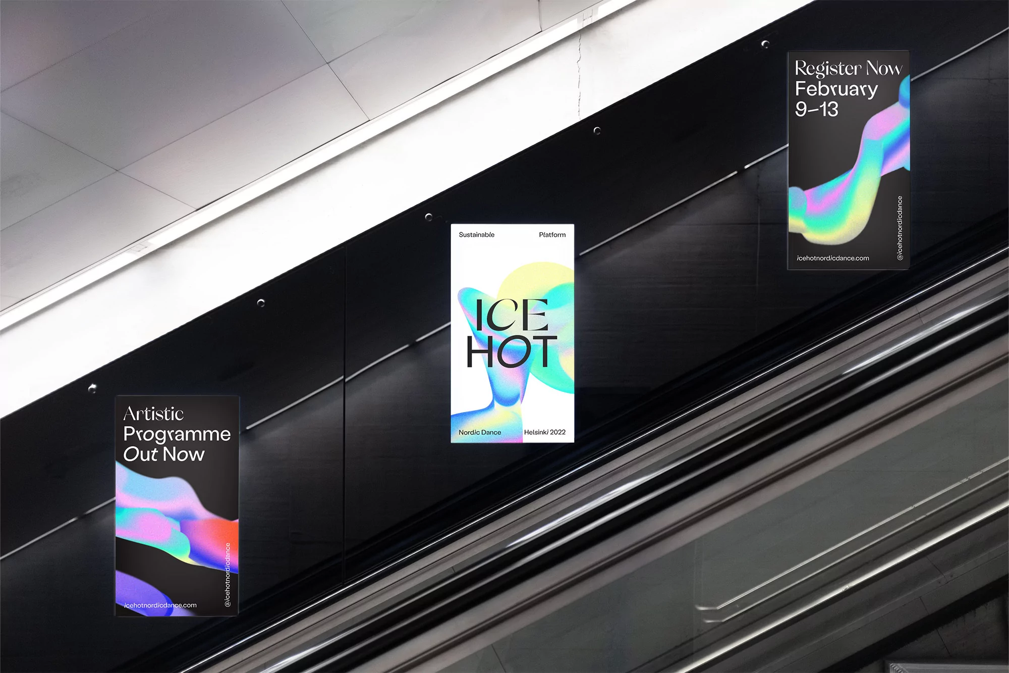 Anthony Burrill brand identity posters displayed along a dark escalator wall in an architectural interior.