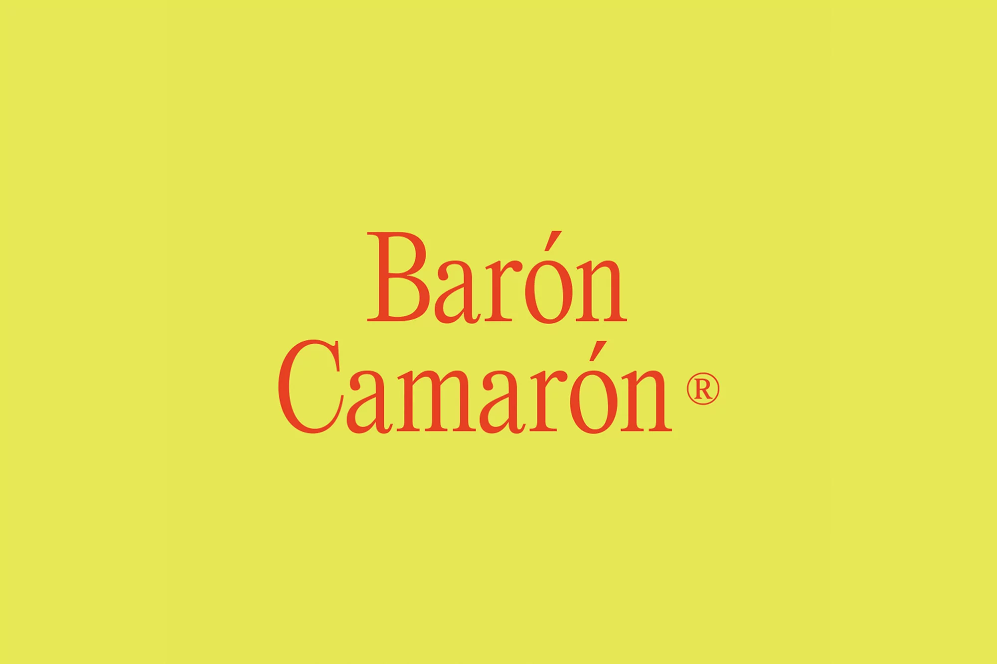 Barón Camarón logo against a yellow background, featuring the brand name in red lettering with a registered trademark symbol.
