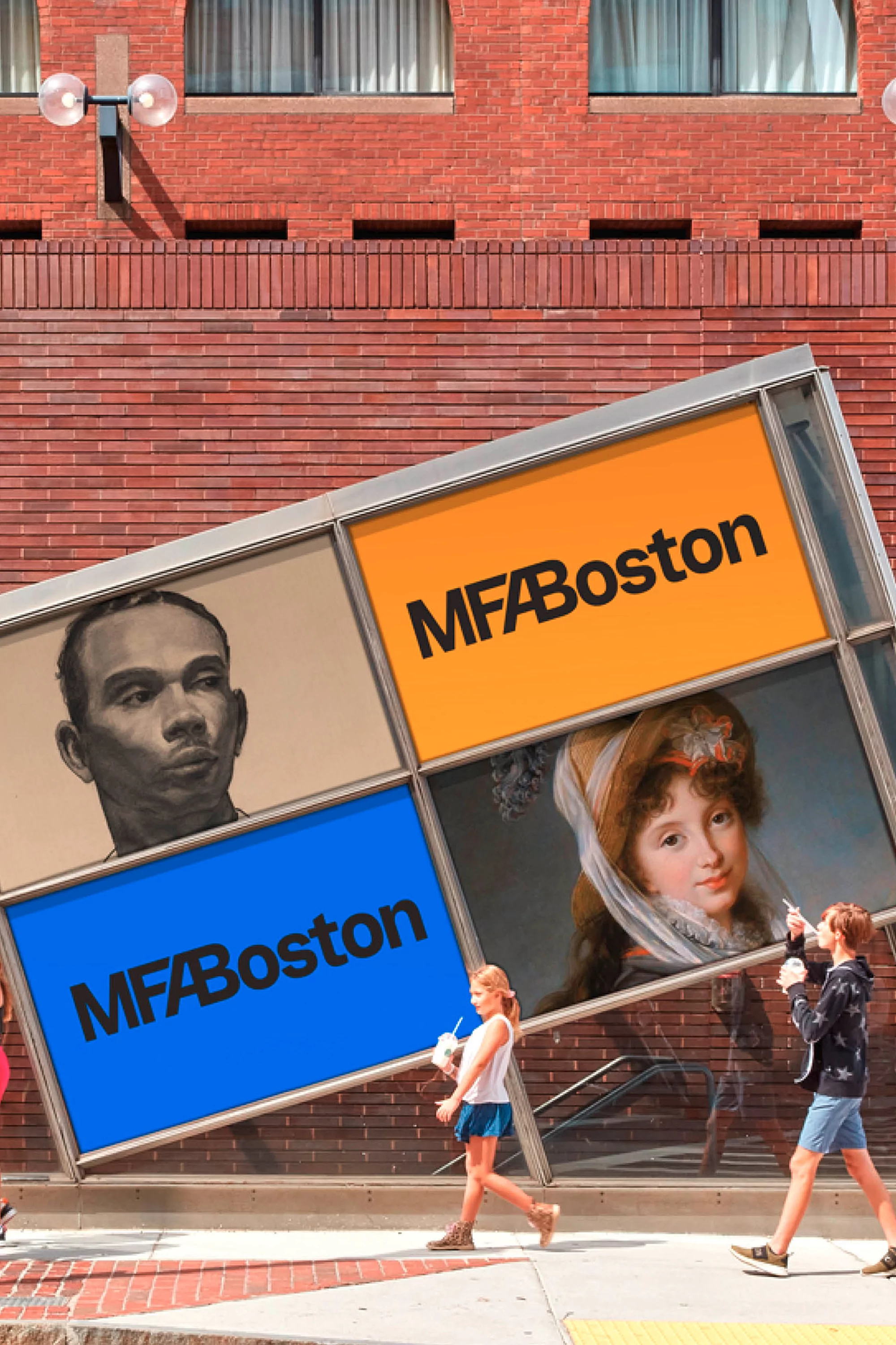 Outdoor display of MFA Boston art portraits with pedestrians walking by, set against a brick building in an urban environment on a sunny day.