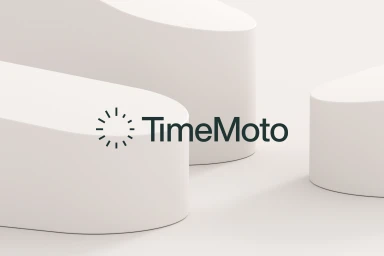 TimeMoto brand logo featuring a sunburst icon and dark typography on abstract white geometric forms