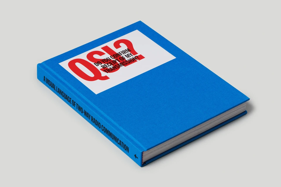 Book cover with the text 'QSI?' in red on a white square and the title 'A Visual Language of Two-Way Radio Communication'.