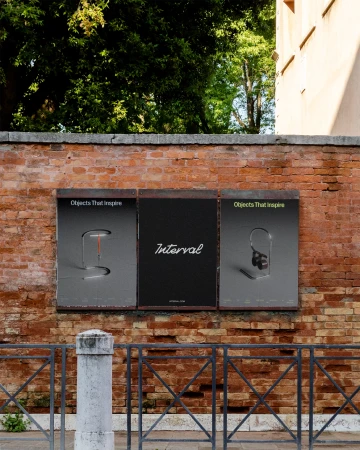 Three promotional posters mounted on an aged brick wall featuring branding and graphic design for Interval
