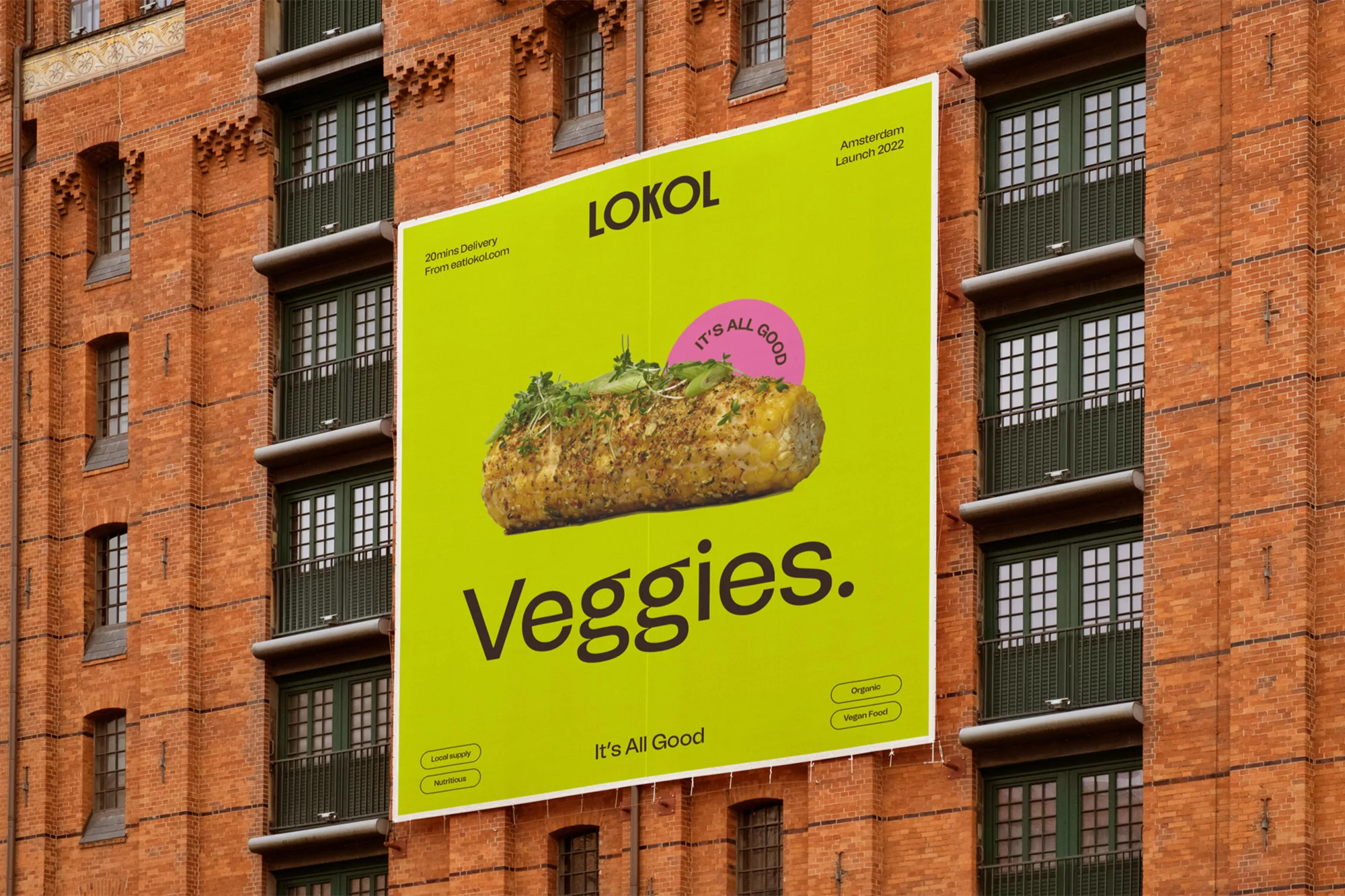 Close-up billboard featuring a large piece of breaded and seasoned vegetable matter with green garnish on a bright chartreuse background.