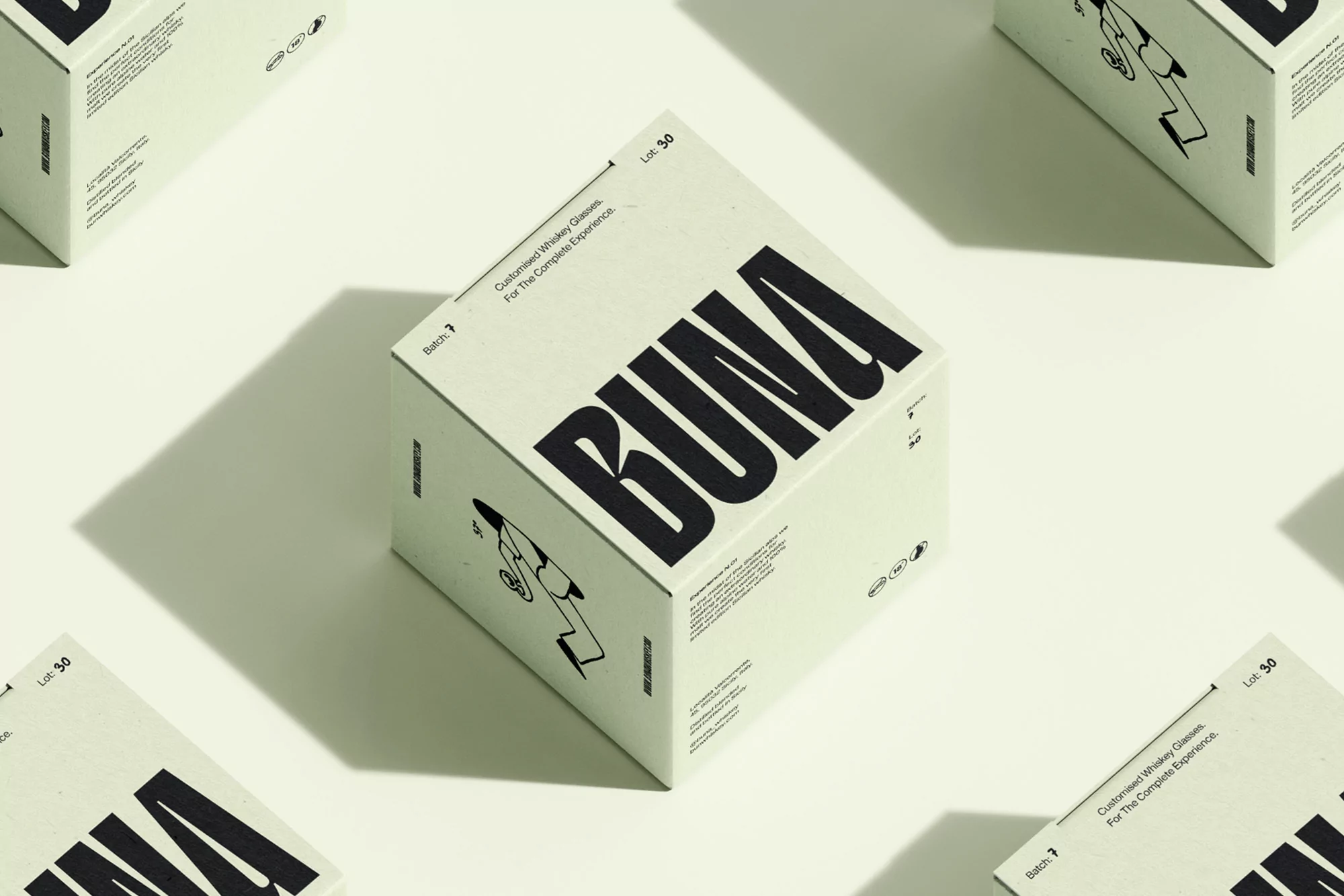 Eye-level shot of BUNA-branded white cubes against a pale backdrop with soft shadows, creating a clean and modern product display.