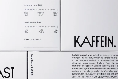Clean white Kaffein coffee packaging featuring typography, intensity and acidity level scales, and brand story text.