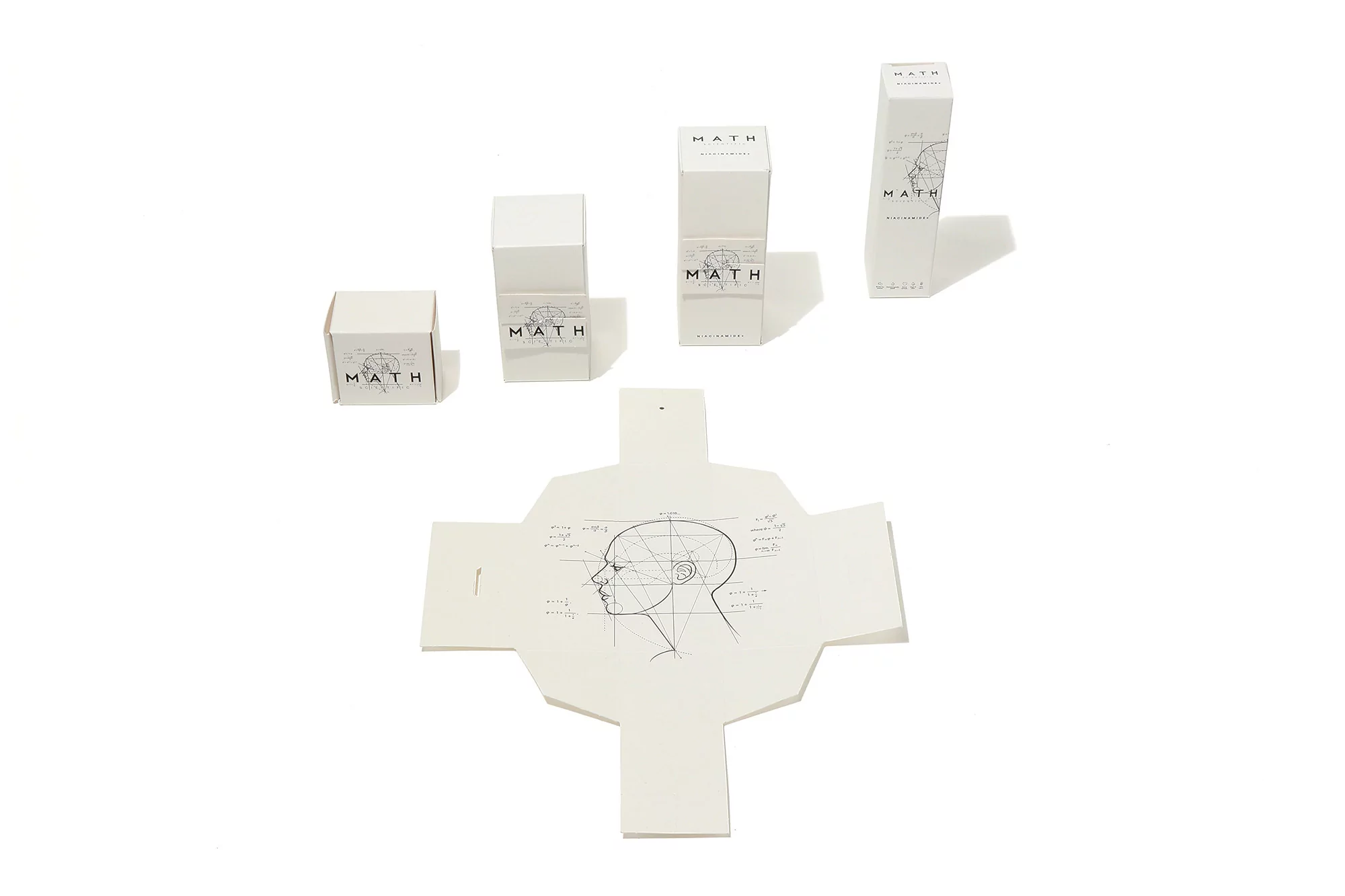 Arrangement of white boxes with 'MATH' logo, plus an open box with anatomical drawing of a human head, all on a white background.
