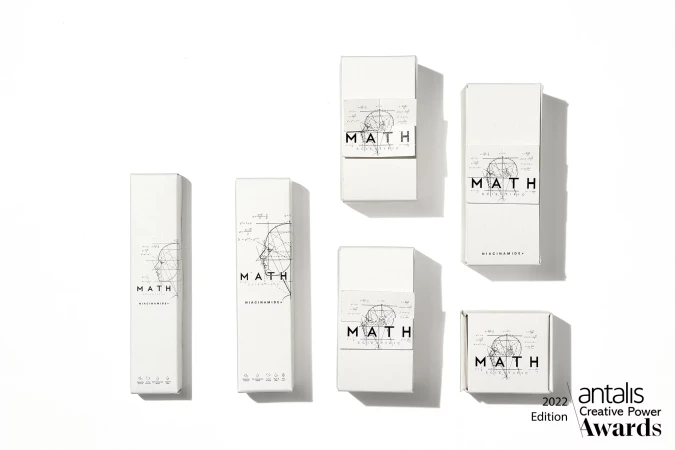 Product packaging featuring a white box with math-themed line drawings and lettering. Clean aesthetic on a white background.