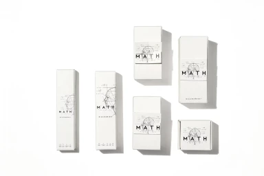 Top-down view of white rectangular and square product packaging boxes arranged on a clean white background