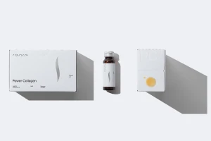 Product packaging and amber glass bottle for SANA Amsterdam Power Collagen arranged neatly on a plain white background.