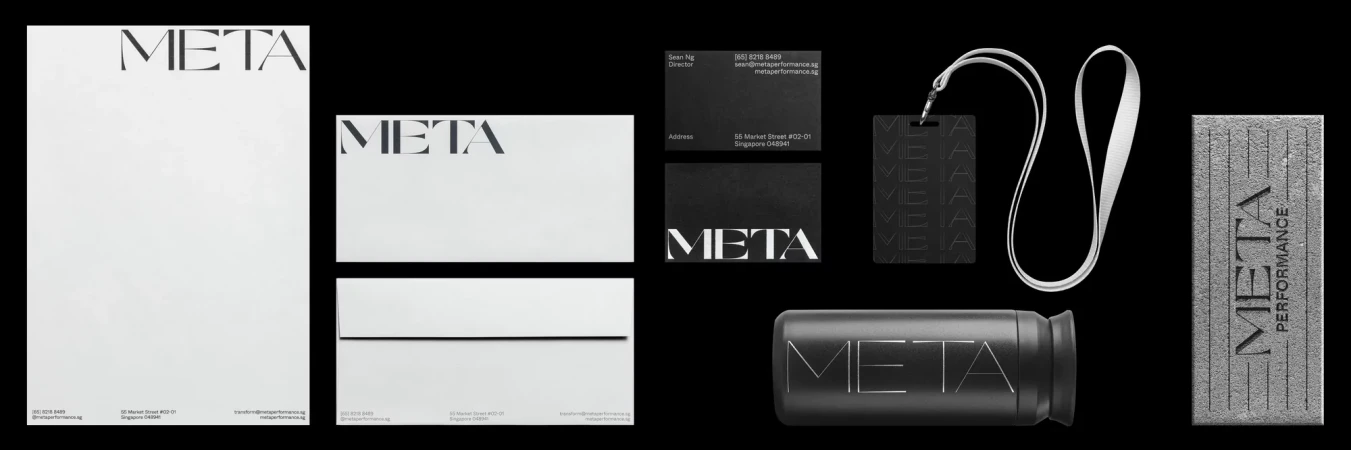 Brand identity mockup featuring letterhead, business cards, lanyard, bottle, and stone block with the 'Meta Performance' logo.