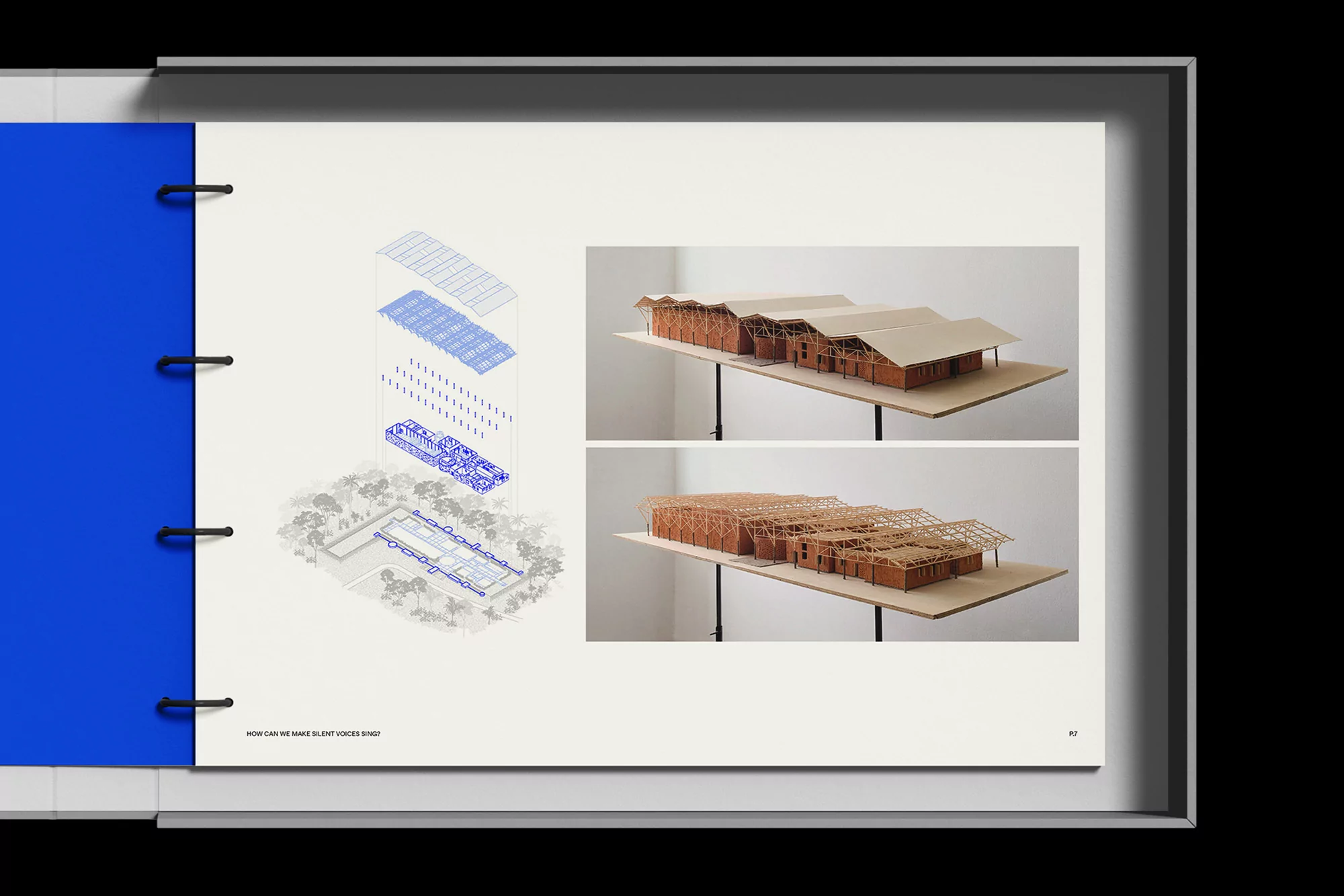 Architectural model of a building is presented in an architectural drawing within a design book, showcasing a detailed design.