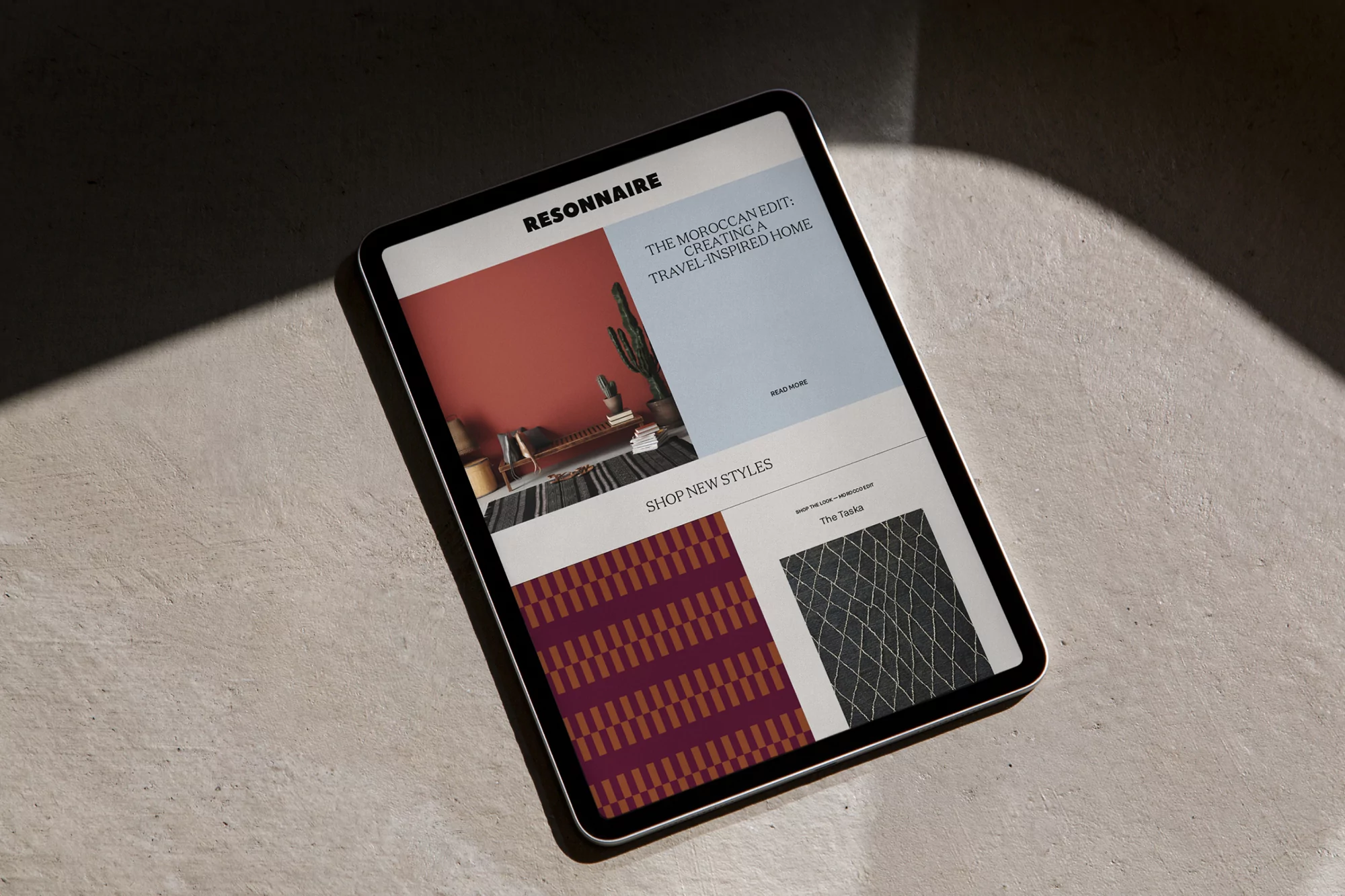 Tablet displaying the Resonnaire website featuring home decor and travel-inspired designs with a focus on Moroccan style.