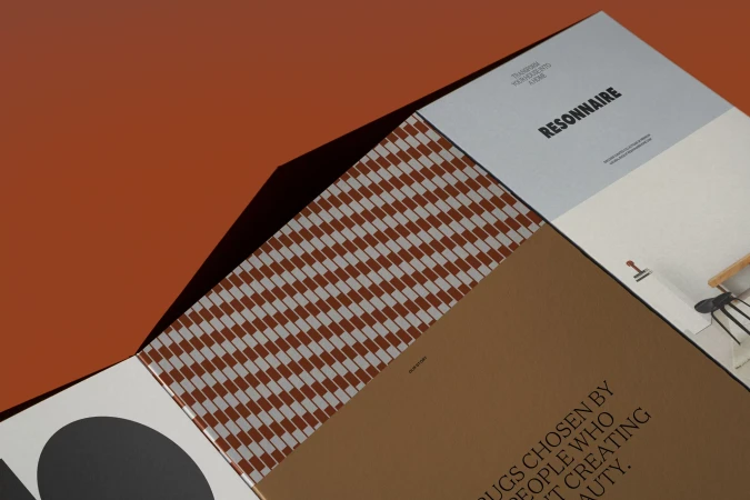Resonnaire brand identity materials featuring geometric printed patterns and typography layouts on textured surfaces.