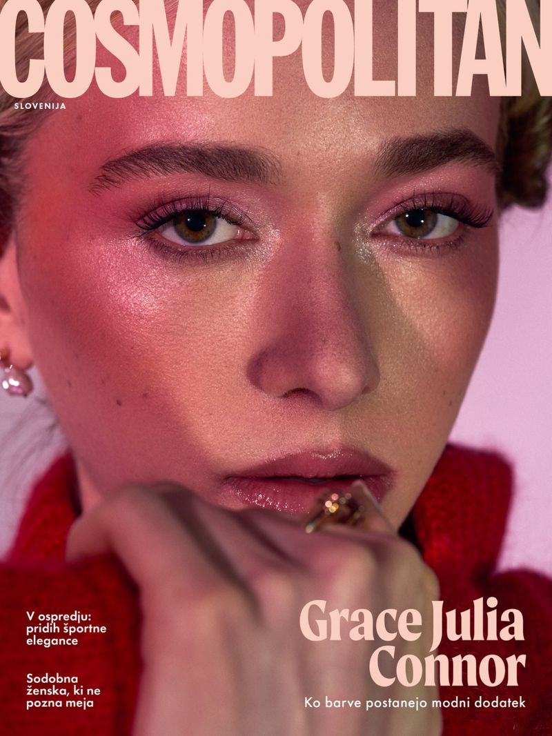 Close-up portrait of a woman with pink eyeshadow and glossy lips on the cover of Cosmopolitan Slovenia magazine.